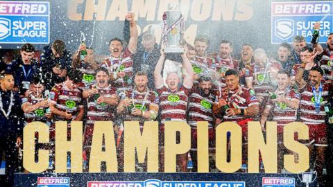 Wigan Warriors celebrating their Super League Grand Final victory in 2024.