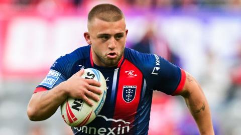 Hull KR's Mikey Lewis runs with the ball
