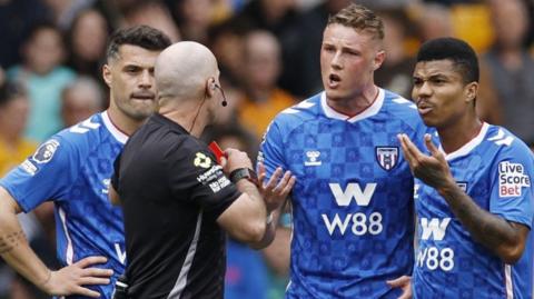 Dan Ballard is sent off