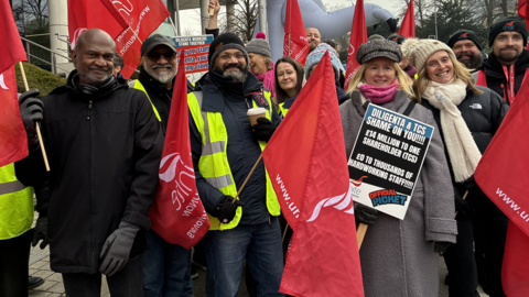A group of workers from Diligenta stood outside offices in Reading taking strike action.