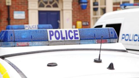 A stock image of police vehicles