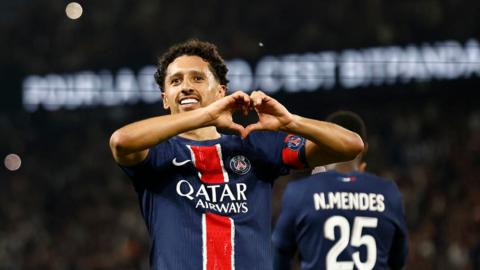 Marquinhos makes a heart with his hands