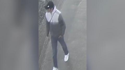 CCTV still of a man