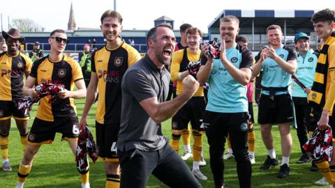 Christian Fuchs celebrates Newport's League Two survival at Barrow