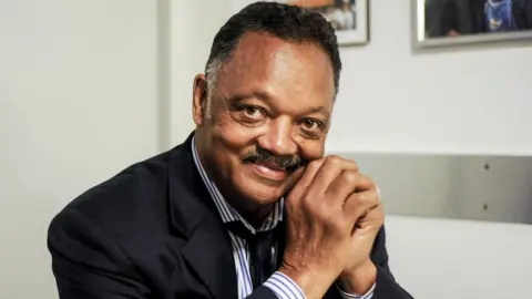 Jesse Jackson smiles 