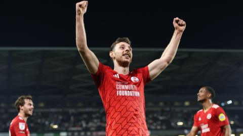 Jack Roles celebrates scoring for Crawley Town against MK Dons