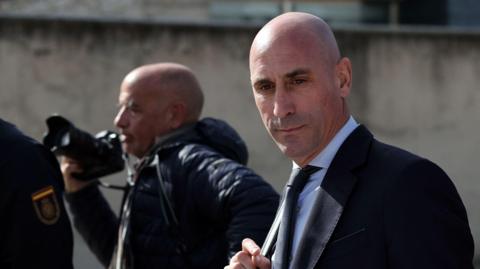 Luis Rubiales leaves the court