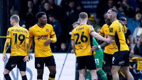 Newport County players celebrate against Barrow