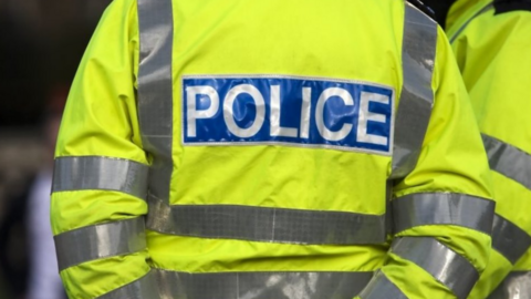 Generic image of a person wearing a police high-vis jacket