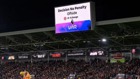 A sign of the decision of offside 