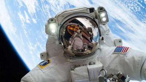 Astronaut floating in space
