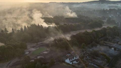  An aerial view shows burnt houses in Stourbridge