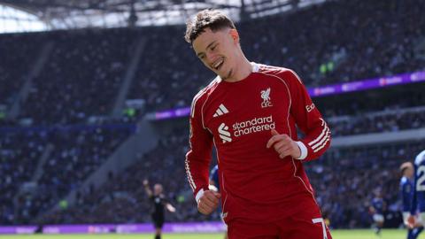 Florian Wirtz smiling during a Liverpool game