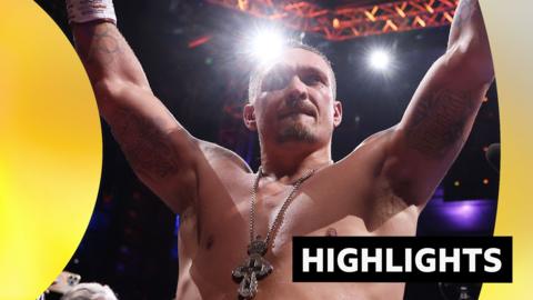 Oleksandr Usyk celebrates his victory