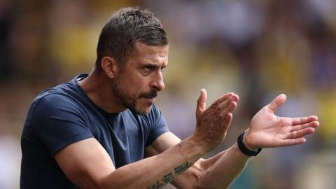 Watford boss Alessio Dionisi claps his hands during the win over Southampton
