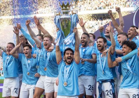Manchester City lift Premier League trophy
