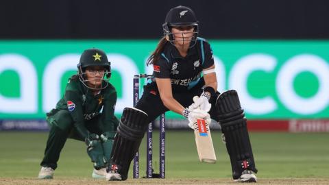 New Zealand's Melie Kerr plays a shot