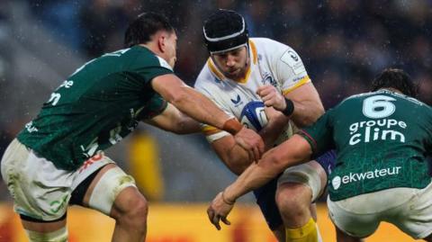 Leinster's Caelan Doris is tackled