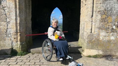 Annie Maw at the top of Glastonbury Tor