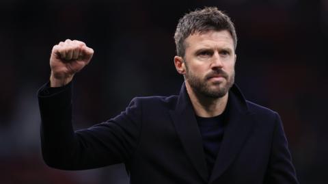 Manchester United interim boss Michael Carrick raises his fist in celebration after a Premier League win over Fulham
