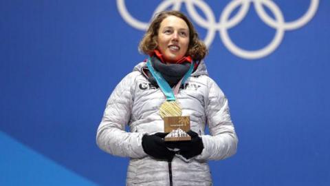 Laura Dahlmeier with a gold medal at the 2018 Winter Olympics