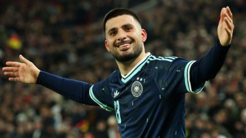 Deniz Undav of Germany celebrates scoring his team's second goal
