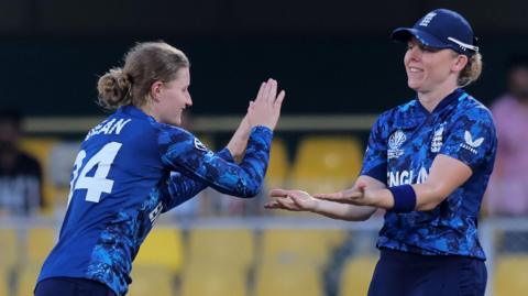 England's Charlie Dean and Heather Knight celebrate a wicket