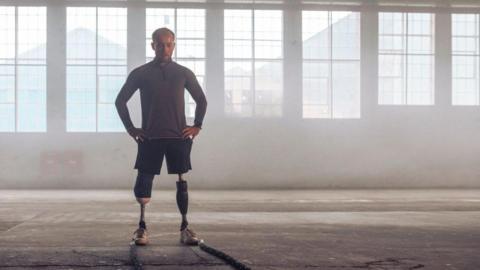 A man with two prosthetic legs. 