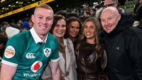 Nathan Doak pictured with family and friends, including father Neil (right)
