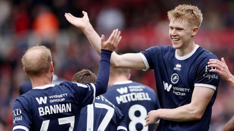 Josh Coburn celebrates scoring Millwall's second goal at Middlesbrough with Barry Bannan