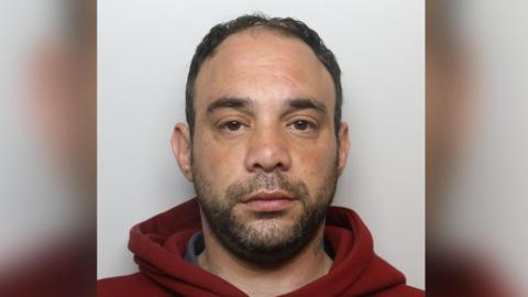 Custody image of Christopher Athanasiou