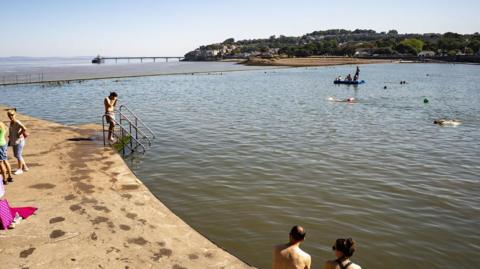People entering Clevedon Marine Lake