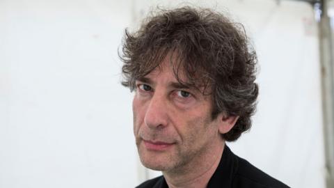 Neil Gaiman looking into the camera