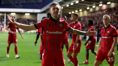 Charlie Lakin scores for Walsall against Chesterfield