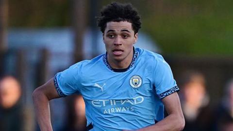 Max Alleyne in action for Man City