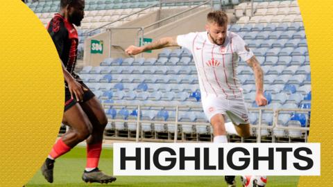 Larne's Andy Ryan swings in a cross against Lincoln Red Imps