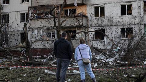 Destruction and debris litters the streets following a massive combined strike by Russian missiles and drones on June 2, 2026 in Kyiv, Ukraine. 