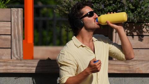 Man drinks water