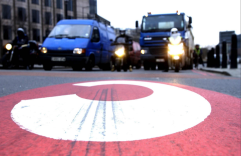 Cars with congestion charge sign