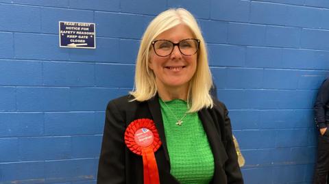 Dr Allison Gardner smiling at the camera after being elected