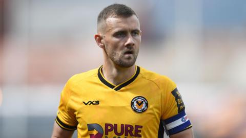 Shane McLoughlin in action for Newport County