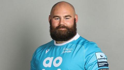 Joe Jones in his sky blue Sale Sharks top