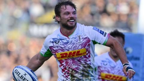 Will Evans celebrates scoring for Harlequins