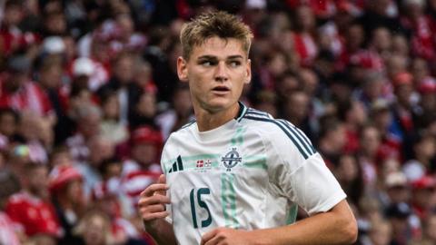 Justin Devenny in action for Northern Ireland