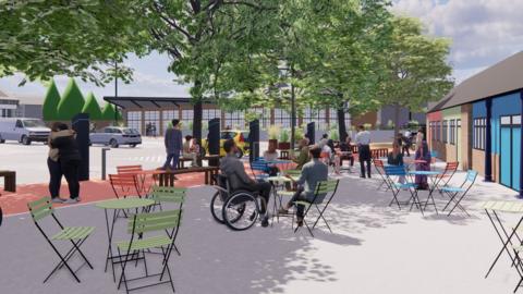 An artist's impression of the finished Stockyard project. There is a building on the right, and on the left of this are chairs and tables next to a line of trees. On the far left, there is a car park. 