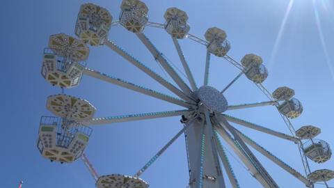 Ferris wheel from below