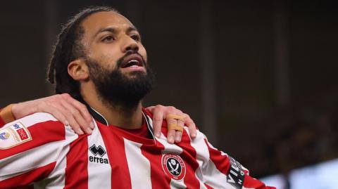 Jairo Riedewald (right) and Tyler Bindon celebrate the former's goal against Norwich City
