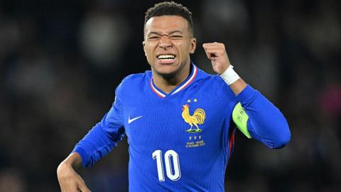 Kylian Mbappe reacts during France's game against Ukraine