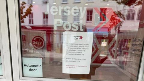 Sign in Jersey Post's building in Broad Street