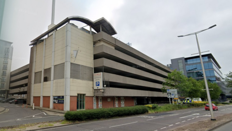 A Google Street image of a six-storey concrete car park.